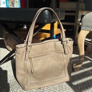 Beautiful gently used Kate Spade shoulder bag.  Tan color. Super clean interior.